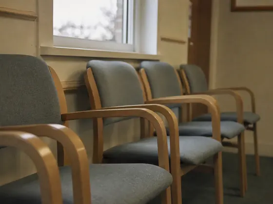plaster on a small leg, waiting room chairs