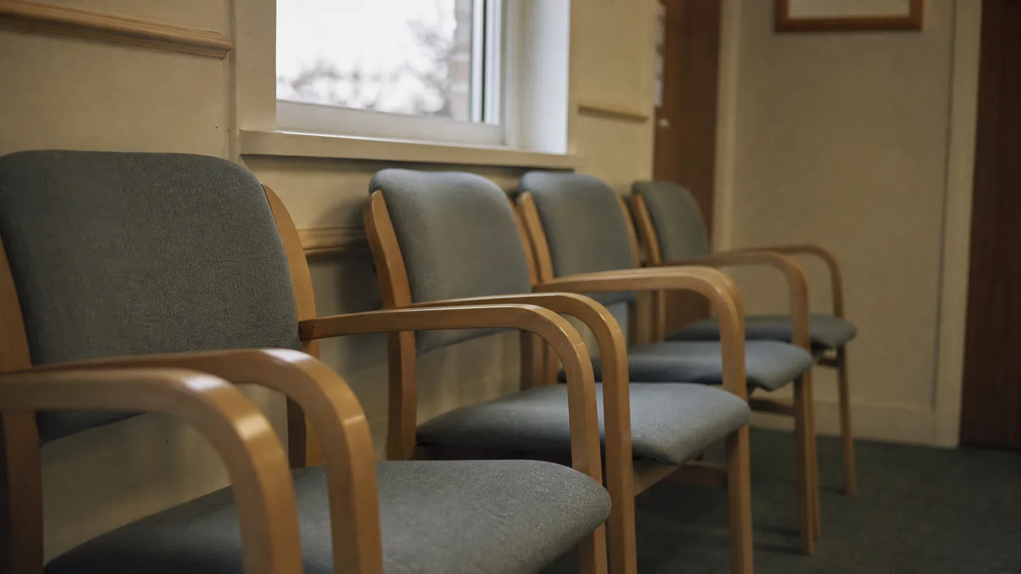 plaster on a small leg, waiting room chairs