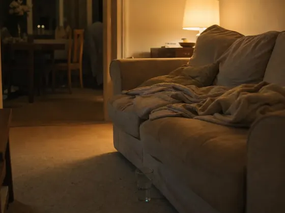 sofa in the evening, lamp, cushions