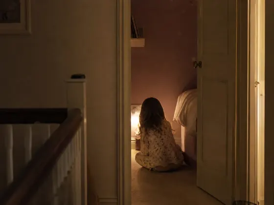 bedroom doorway, child’s room, night
