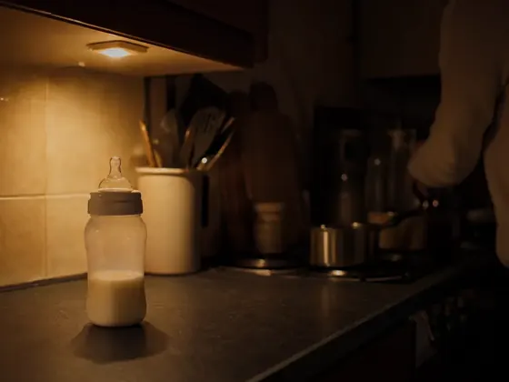 measured bottle on a worktop, night kitchen
