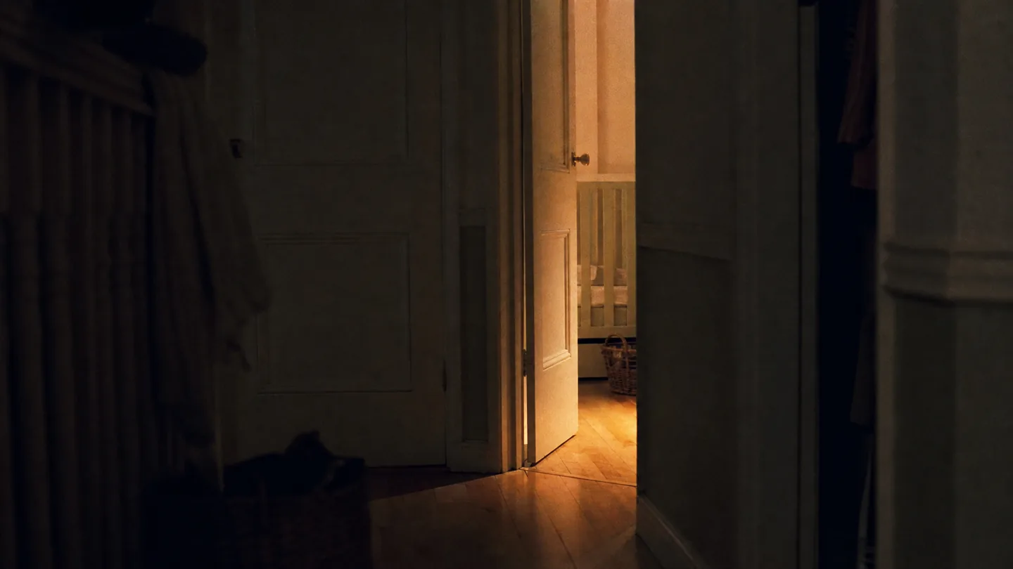 hallway, nursery door ajar, evening