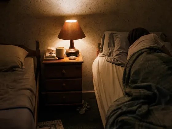 two beds in one room, evening lamp