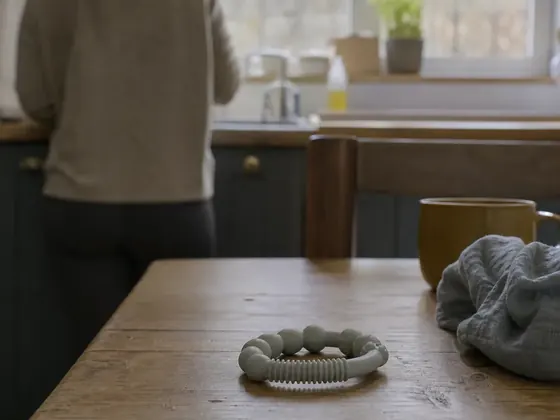 teething ring, kitchen table